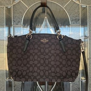 Coach bag. Bought in Chicago, never carried.